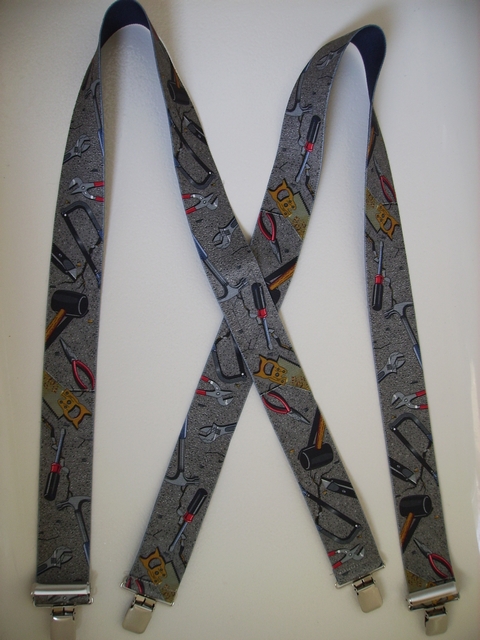 HAND TOOLS GREY BACKROUND 2"X48" Suspenders with 4 strong 1"x 1" Grips and 2 Length Adjusters in the front, all in NICKEL FINISH. Entirely Stretchable Cotton/Polyester Material. Entirely Stretchable Cotton/Polyester Material. UA250N48HTGY